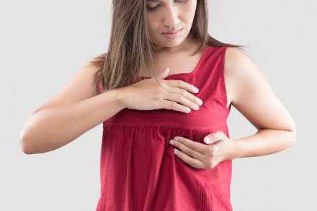 Болит грудь во время менструации
